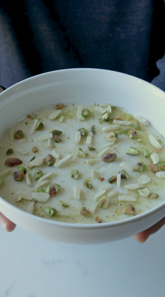 8. Let it cool down in room temperature for 30 min then put it into the refrigerator for a few hours or overnight. 

9. Garnish with some ground up pistachios and sliced almonds.